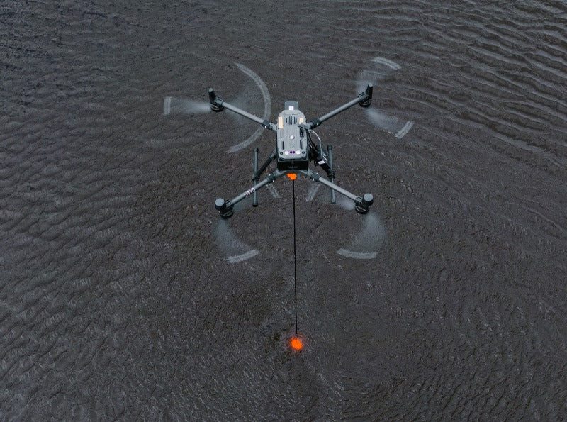 EchoLogger ECT D052S dual-frequency echo sounder flying under a drone